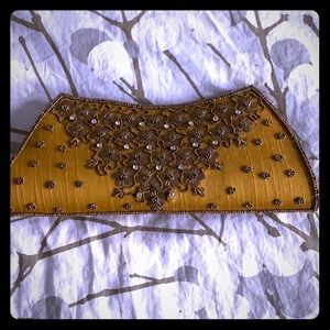 Hand clutch- beautiful gold and bronze piece